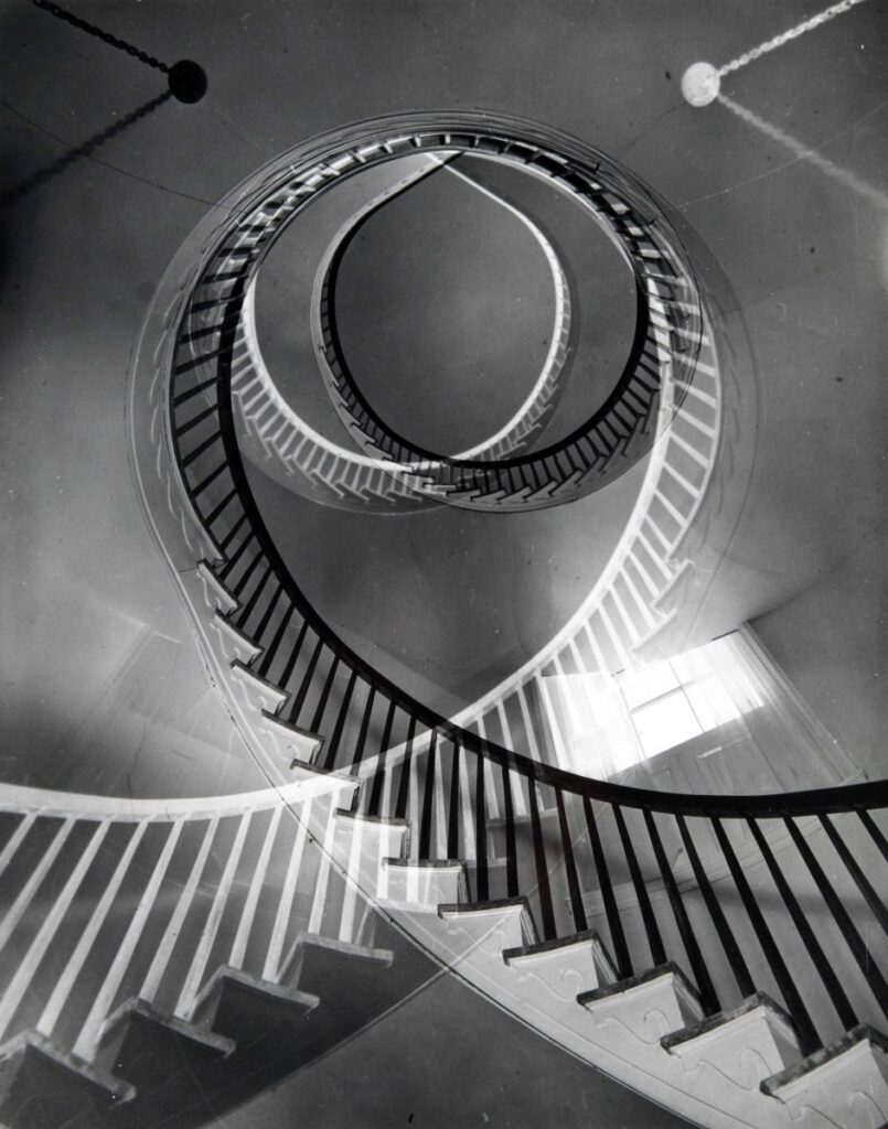 Two intersecting spiral staircases.